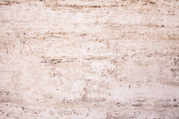 istock Wall of limestone beige 890110220