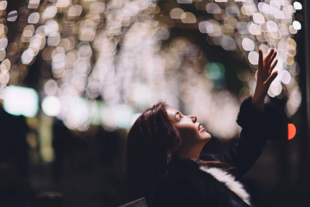 istock Woman Trying To Reach Light 890110288