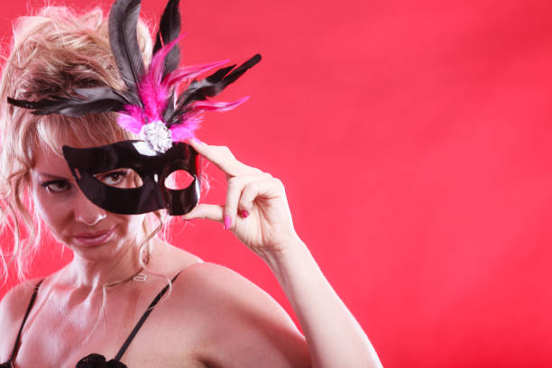 istock Woman with carnival mask. 890118480
