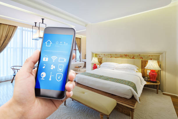 istock smart phone with smart home with modern bedroom 890121042