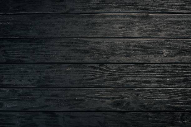 istock Black wooden texture background. Top view. Free space for text. 890123802