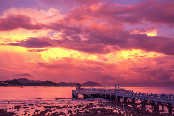 seascape - pier and beautiful purple sunset