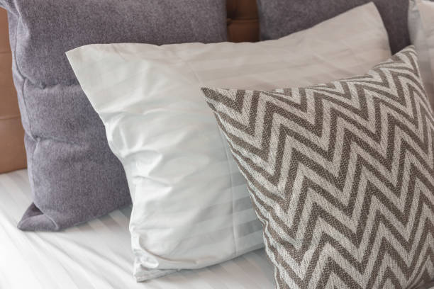 istock modern style bedroom with set of pillows 890150488