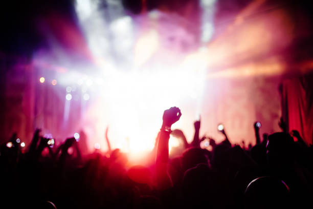 istock People partying at a concert 890153860