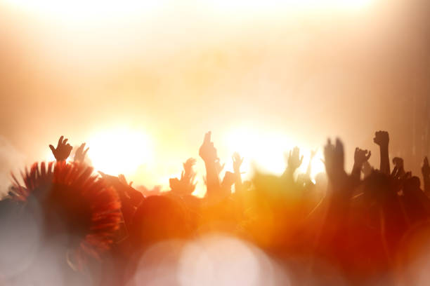 istock People partying at a concert 890154524