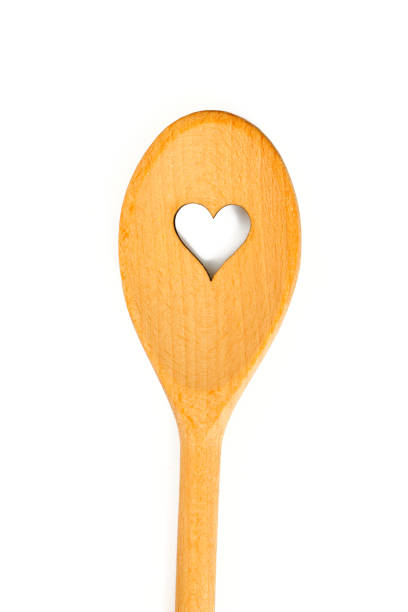 istock wooden spoon with a heart 890160410