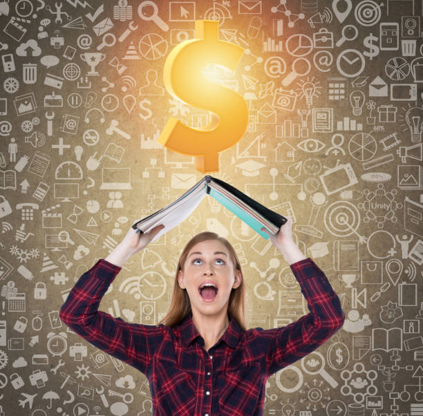 istock Young woman with file and glowing dollar sign 890160736