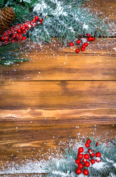 istock Christmas wooden background with snow branch. Top view with copy space for your text 890170968