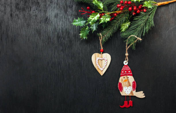 istock fir and Rowan. Black background. Christmas background. Beautiful photo 890173428