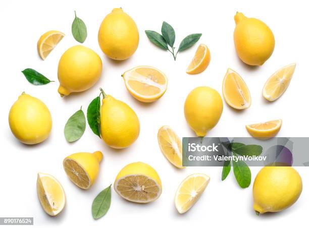 Ripe Lemons And Lemon Leaves Stock Photo - Download Image Now - Lemon - Fruit, Slice of Food, White Background