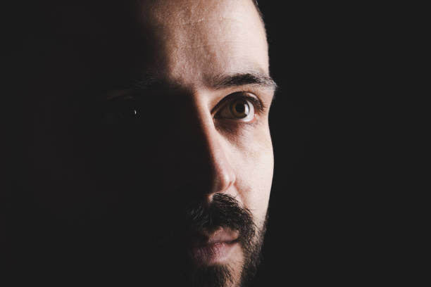 istock Close up portrait serious brunette bearded man 890201558