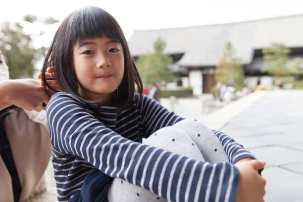 Japanese girl relaxing at temple