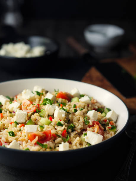 istock Healthy fluffy brown rice and chopped herbs salad 890218582