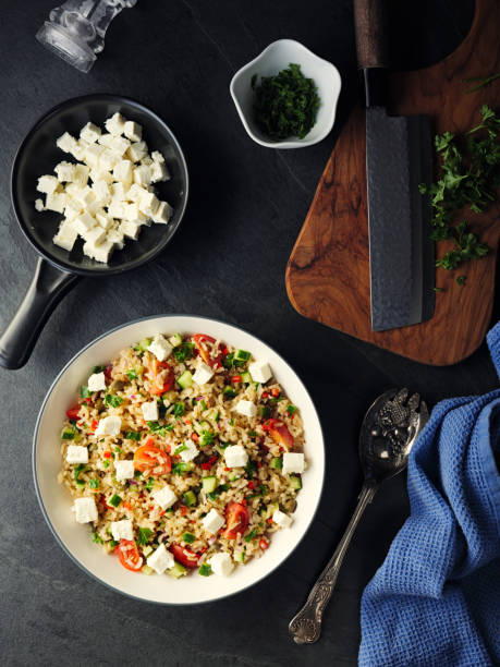 istock Healthy fluffy brown rice and chopped herbs salad 890218594