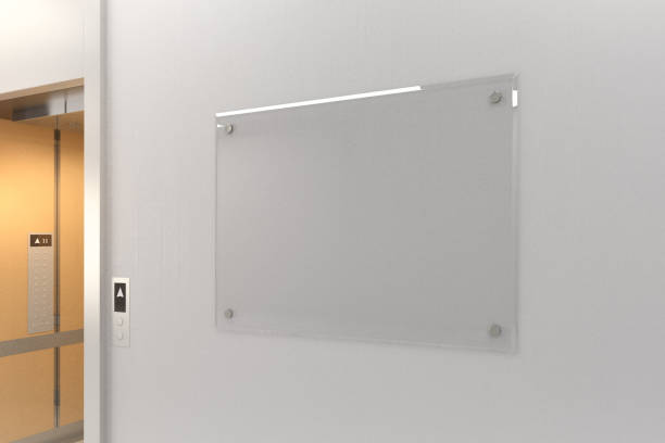 istock Blank glass poster on concrete wall 890220970