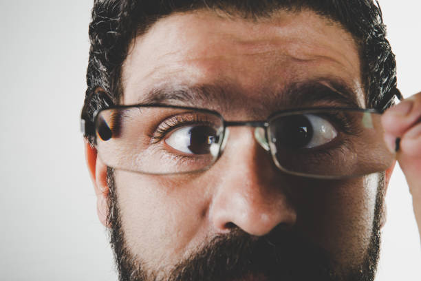 close up cropped photo of mature blond man with beard and moustche in glasses