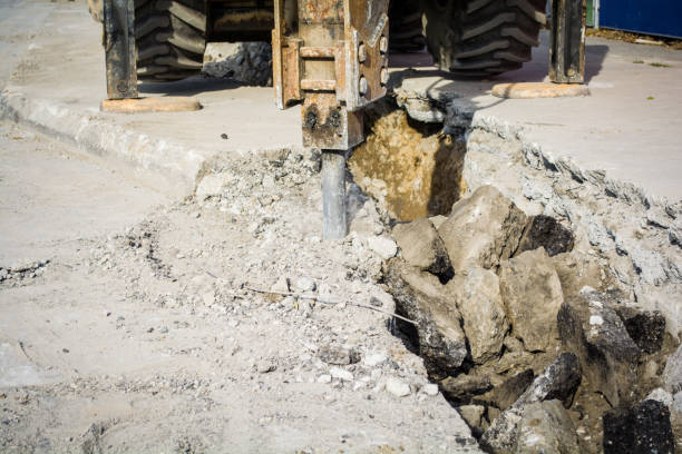 istock an excavator in a road construction site 890226388
