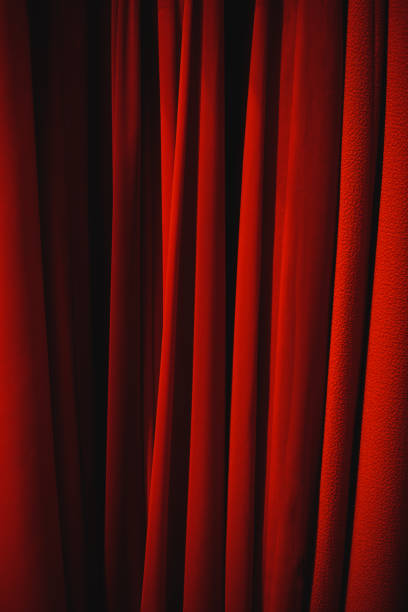 istock Artistic style - grunge theater red curtain background 890227140