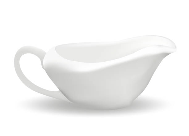 istock White ceramic sauceboat for sauce. 3d realistic style. Saucers. Isolated on white background. Empty dishes. Vector illustration. 890229994