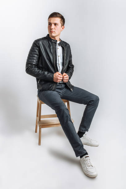 istock The guy in the Studio. The guy in the black jacket. Handsome guy 890231112