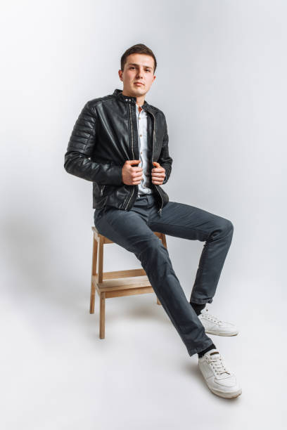 istock The guy in the Studio. The guy in the black jacket. Handsome guy 890231120