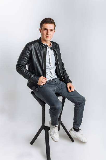 istock The guy in the Studio. The guy in the black jacket. Handsome guy 890233224