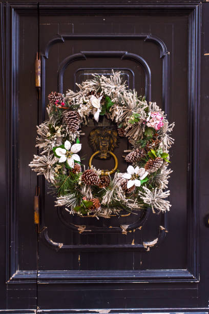 istock Christmas wreath on the door in retro style 890233976