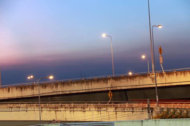 istock expressway and Street lighting on twilight sky. 890234294
