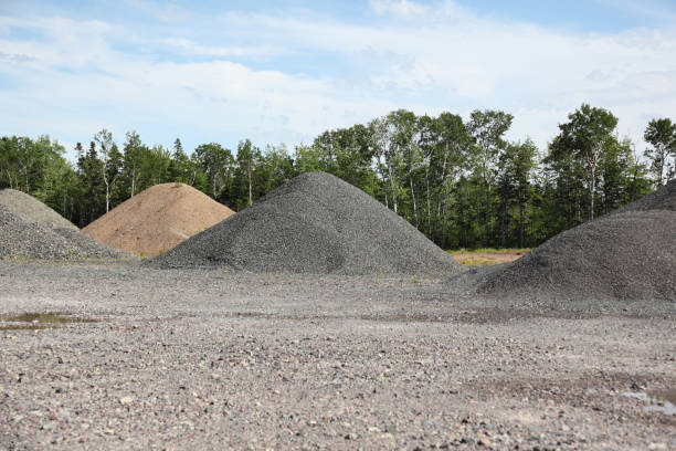 istock Piles of construction material, gravel, aggregate 890239634