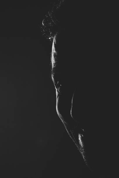 istock Profile photo of a man on black background 890244190