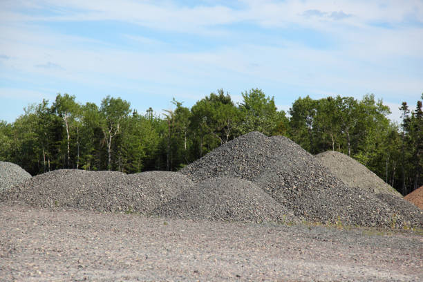 istock Piles of construction material, gravel, aggregate 890248696