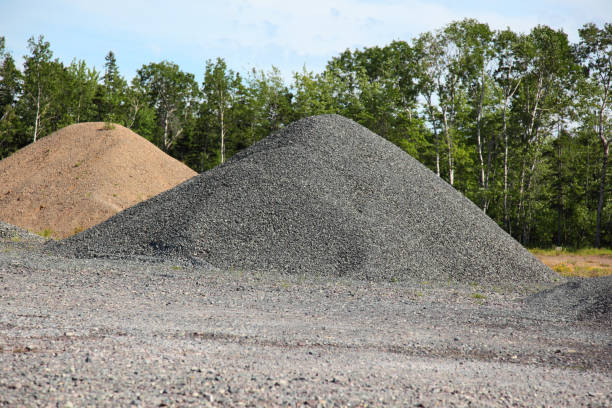 istock Piles of construction material, gravel, aggregate 890251624