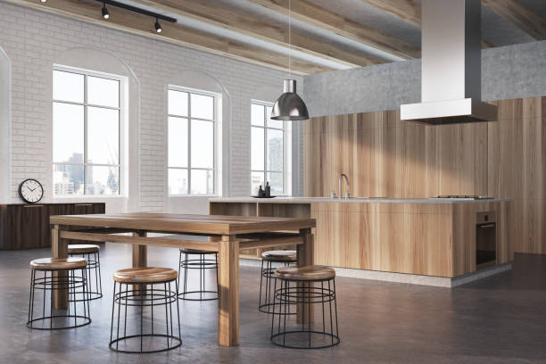 istock Concrete and wooden dining room, side 890251940