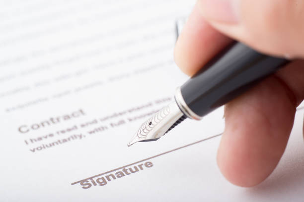 istock signaure for contract with fountain pen 890252036