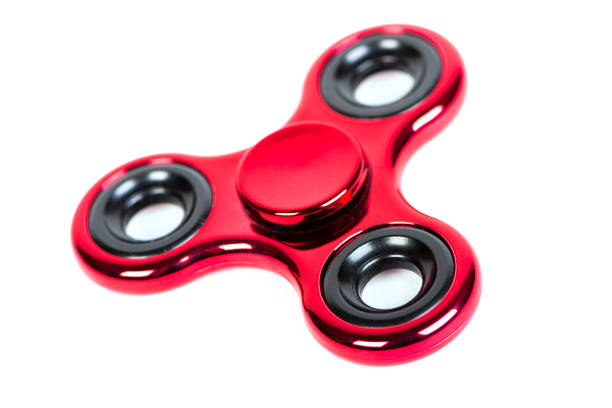 rood metallic fidget spinner - handspinner stockfoto's en -beelden