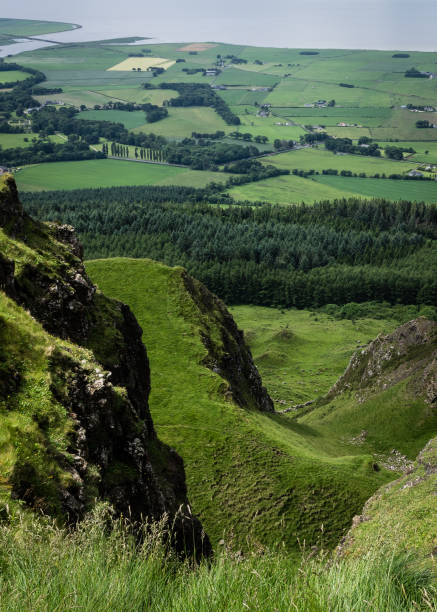 View from the top of Binevenagh (a mountain in County Derry / Londonderry, Northern Ireland), towards the level flood plain of the River Roe and the northern coast of Northern Ireland.
