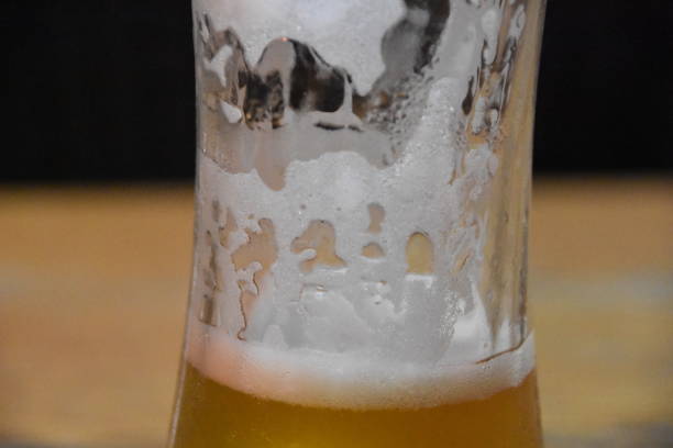 istock glass of beer against a dark night 890265830