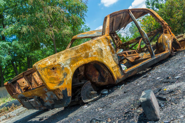 istock An abandoned, stolen burnt out car 890267110