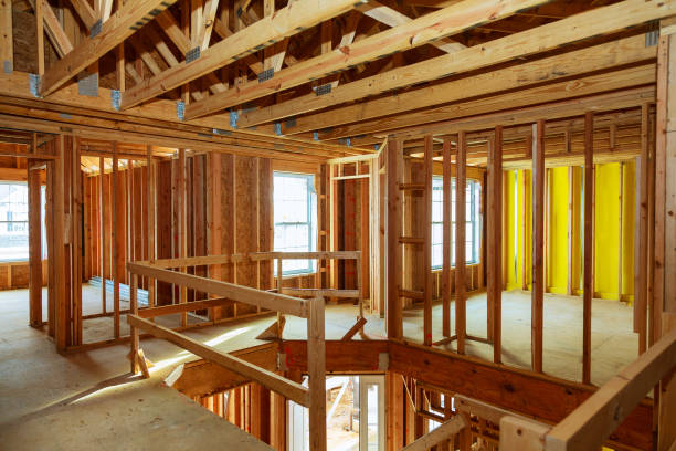 istock unfinished wood frame building or house 890270158