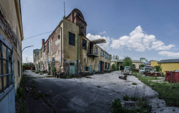istock old factory with tower panorama 890276502