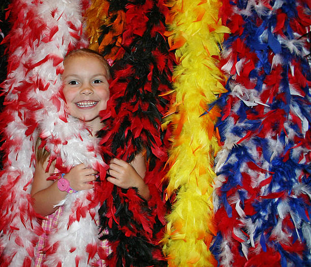 istock Girl hiding in feather boas 89028818