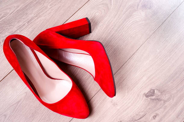 istock Red female shoes on high heels 890293944