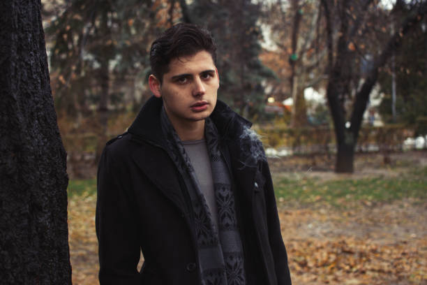 istock Young man in a public park 890294306