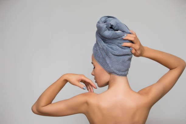 Woman with towel on head