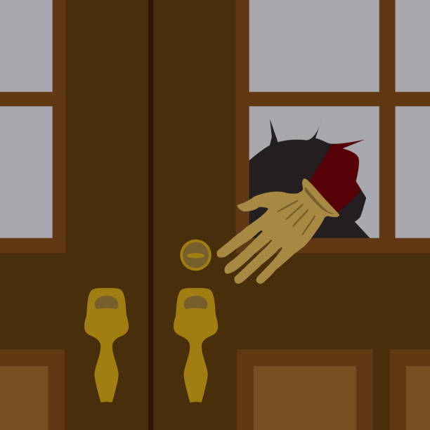 A Thief in the Night A thief's gloved hand is reaching through a broken pane of glass on the front door of a house prowling stock illustrations
