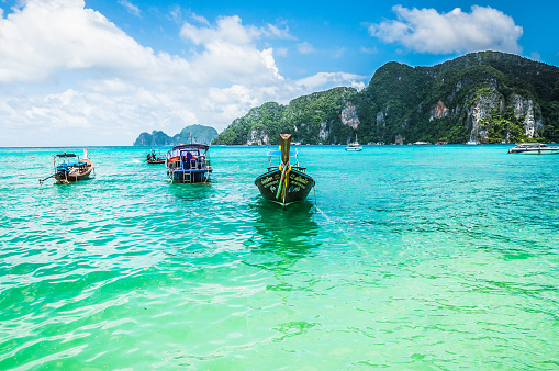 Thai tail boats near krabi island coast