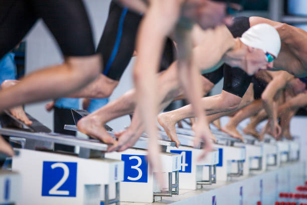 istock Start of a swimming competition 890320246