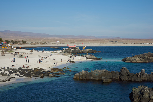 Bahia Inglesa, Antofagasta Region, Chile - September 2, 2017: Waterfront of the historic coastal town of Bahia Inglesa on the edge of the Atacama Desert in Chile.
