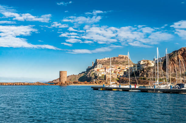 View of ancient village from the harbor View of ancient villageof Castelsardo - Sardinia  from the harbor in a suny day castelsardo stock pictures, royalty-free photos & images