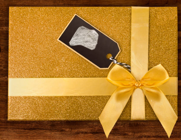 istock A gift box with Rwanda drawn on a label with chalk.(series) 890349168
